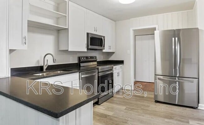 Building Photo - 1210 Downing Rd