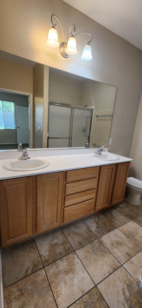 Building Photo - Freshly painted & all new carpeting - 3BR ...