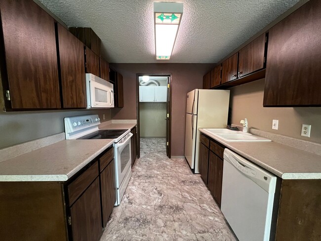 Building Photo - Non-Refundable & Security Deposit Total: $...
