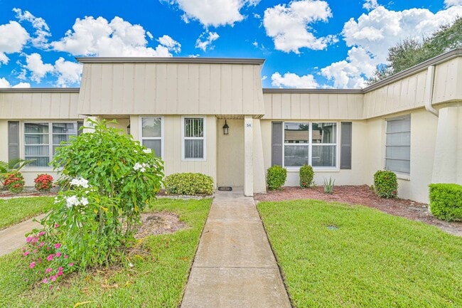Building Photo - NOW AVAILABLE - Well Maintained Villa in C...