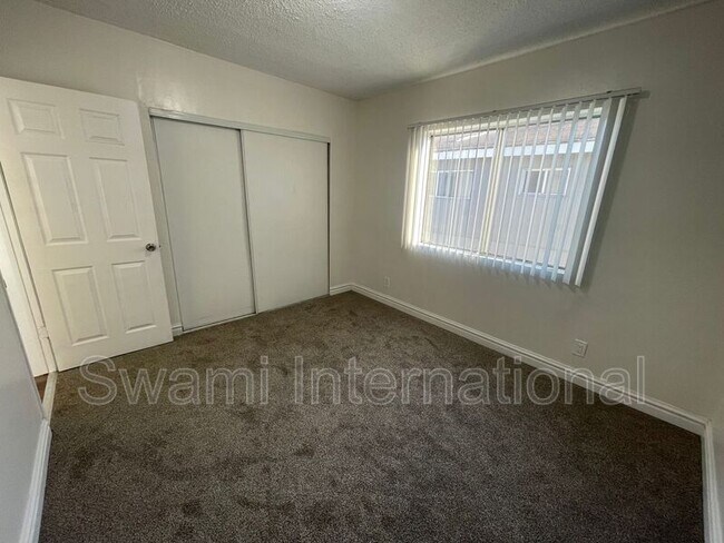 Building Photo - 10970 S Figueroa St