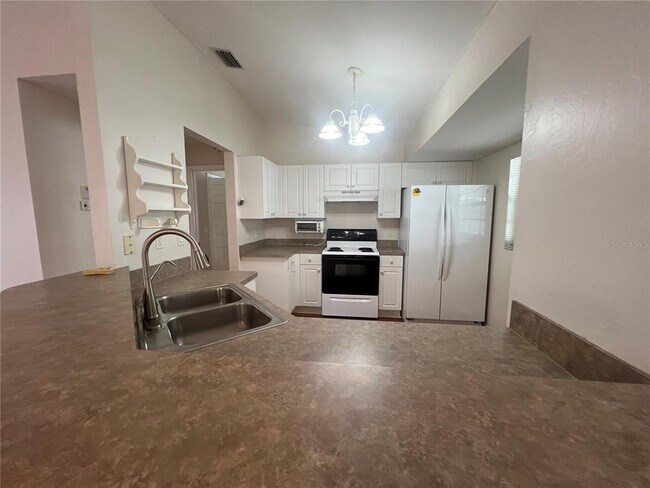 Building Photo - 3228 Lucaya Ave