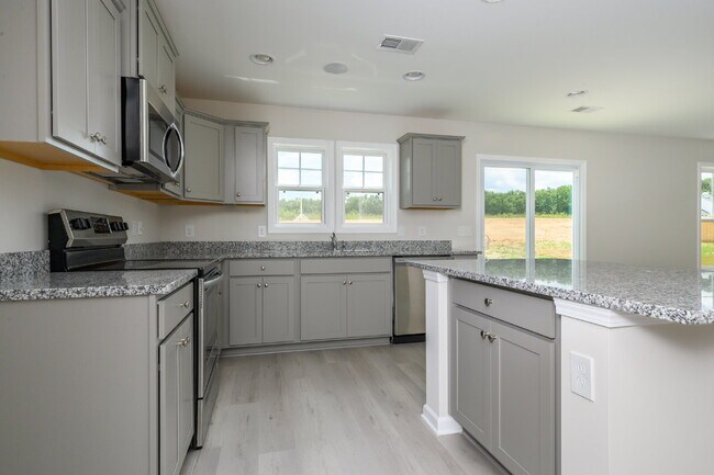 Building Photo - Elegant 4 Bedroom, 2 Bathroom Home with Modern Finishes & Open-Concept Living $2,150/mo rent