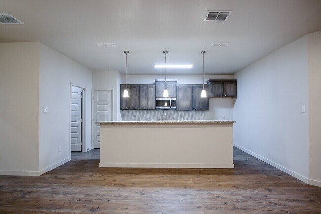 Building Photo - Beautiful Like-New Townhome Located South of Town Near Cooper Elementary