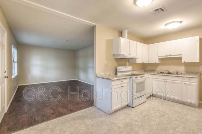 Building Photo - 212 201st E Ave