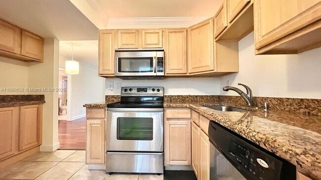 Building Photo - 303 Gardens Dr