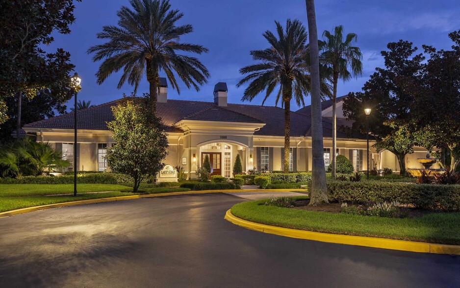 Clubhouse entrance at dusk - Lake's Edge Apartments