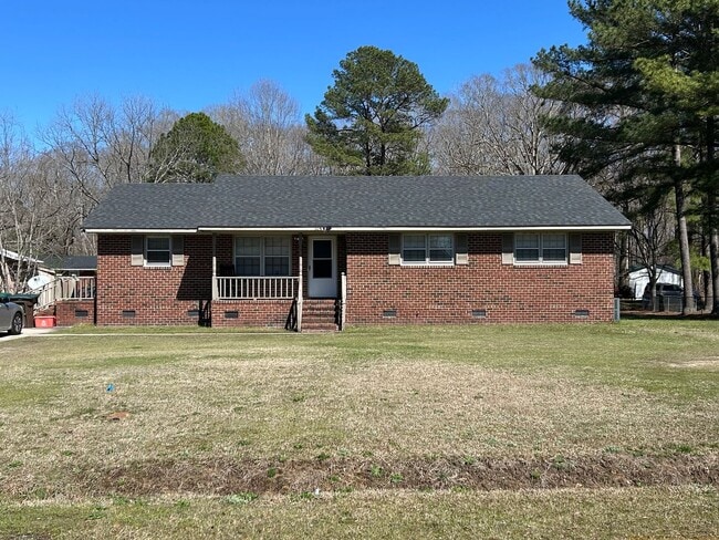 Building Photo - Three bedroom two bath home for rent in Ta...