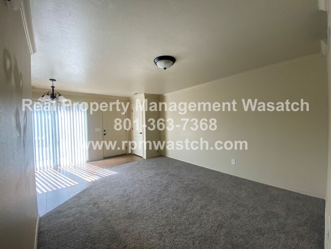 Building Photo - Come See This Great 2 Bedroom 1 Bath Condo In Salt Lake City!
