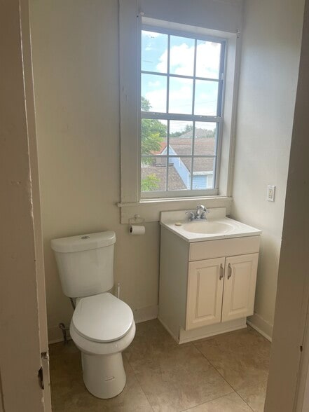 Bathroom toilet and sink - 1230 Mandeville St