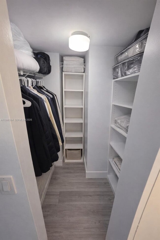 Building Photo - 3675 N Country Club Dr