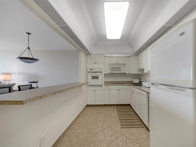 Building Photo - 19380 Collins Ave