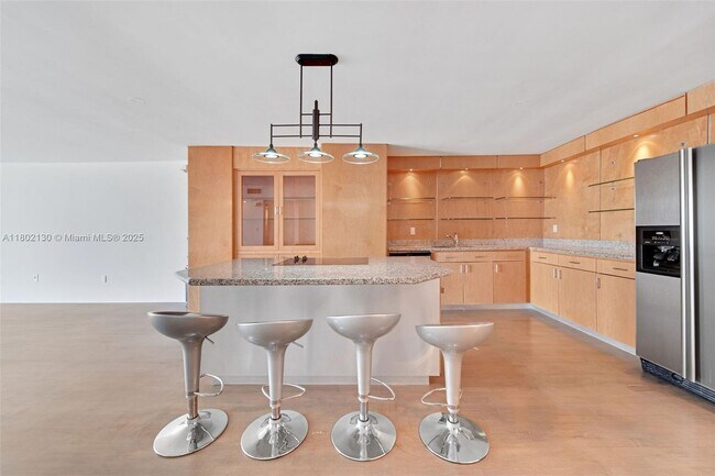 Building Photo - 6423 Collins Ave