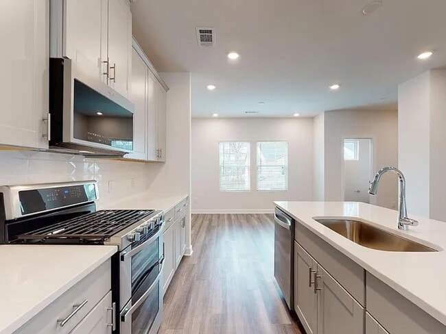 Building Photo - spacious and beautifully appointed townhome