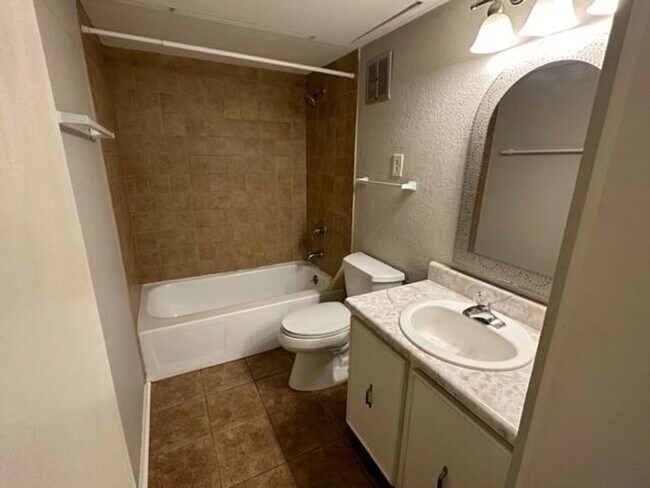 Building Photo - 6687 Whispering Oaks Place #2