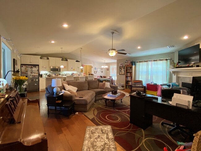 Building Photo - FENCED BACKYARD! BONUS ROOM/OFFICE! SAFE ROOM! THREE CAR GARAGE