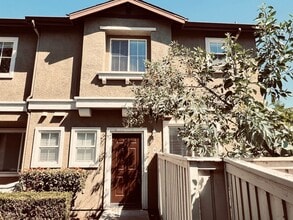 Building Photo - Recently Reduced Price- Chula Vista 3 Bedroom 2.5 bath townhome style corner unit