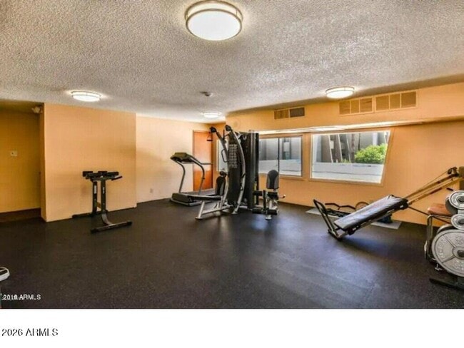 Building Photo - 7625 E Camelback Rd