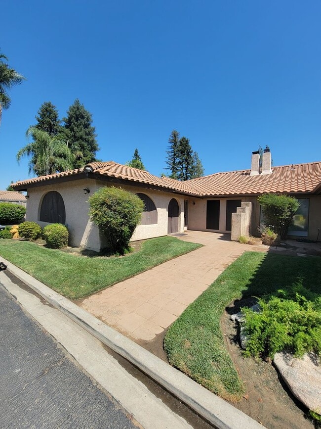 Primary Photo - Condo with open floor plan and a two-car g...