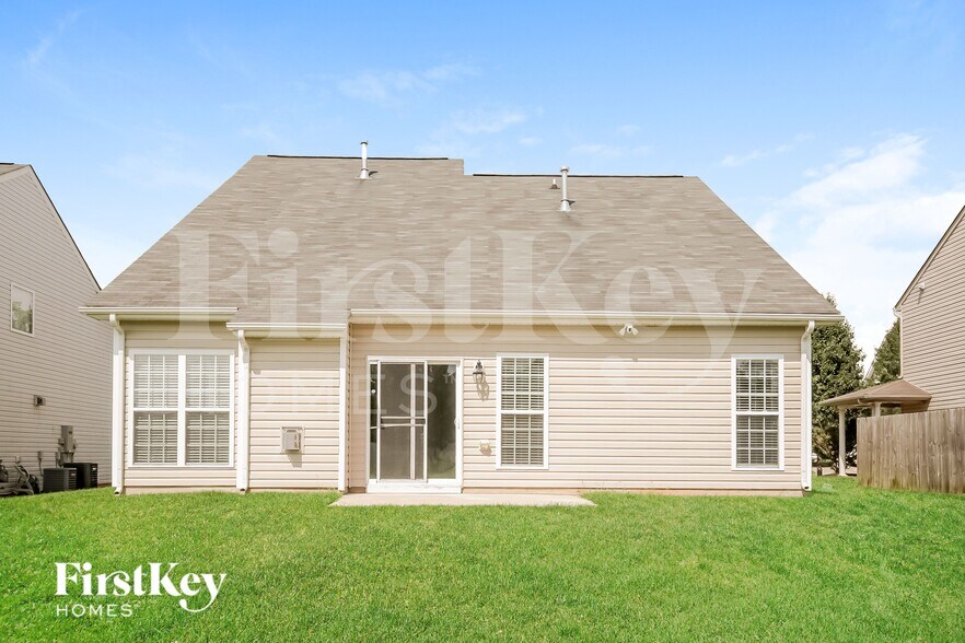 Building Photo - 6806 Championship Dr