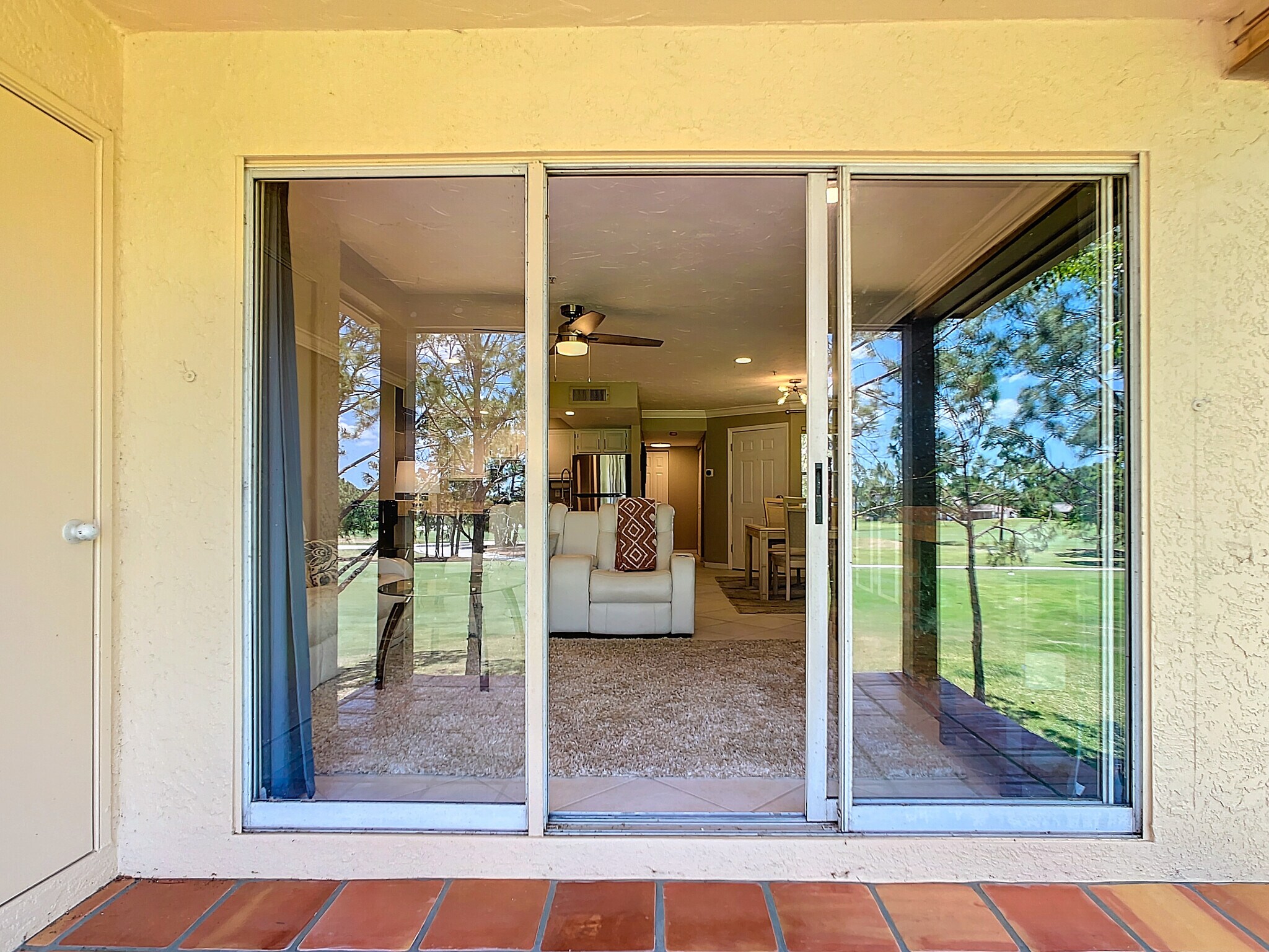 Balcony, entrance to living room - 2400 Feather Sound Dr Apt 421