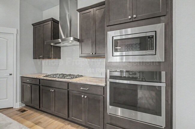 Building Photo - 21087 E 62nd Dr