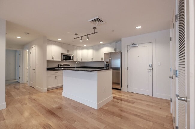 Building Photo - 2BR/2BA Old Port Condo Onsite Parking Available, Fitness Room and Elevator