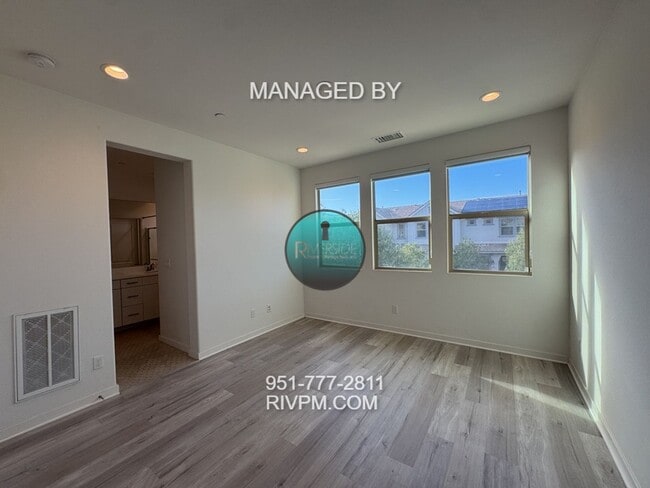 Building Photo - DISCOVER YOUR DREAM CONDO AT BEDFORD IN CORONA!!  SOLAR INCLUDED!