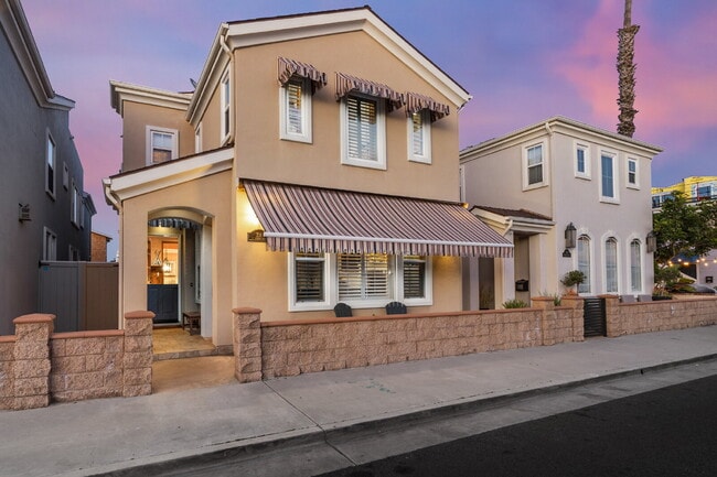 Building Photo - "Coastal Tommy Bahama at 208 East Balboa: Fully Furnished 3-Bed Sanctuary with Rooftop Deck