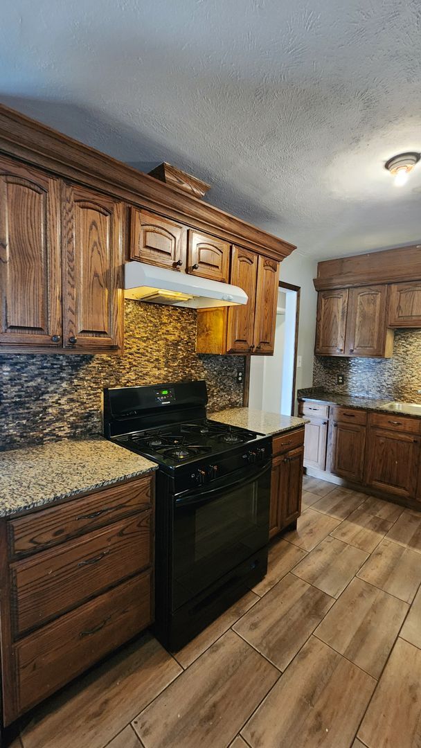 Building Photo - 4 Bed 2 Bath Home with Covered Carport in Bethany