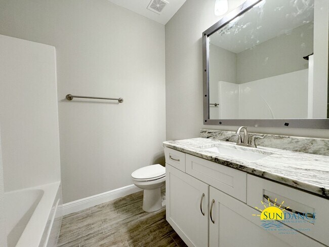 Building Photo - Stunning Centrally Located, a MUST see!