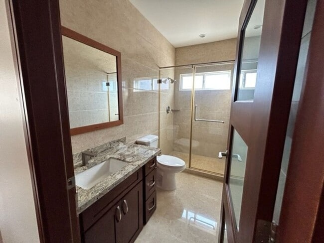 Building Photo - Like New Single Family Home in McCully!