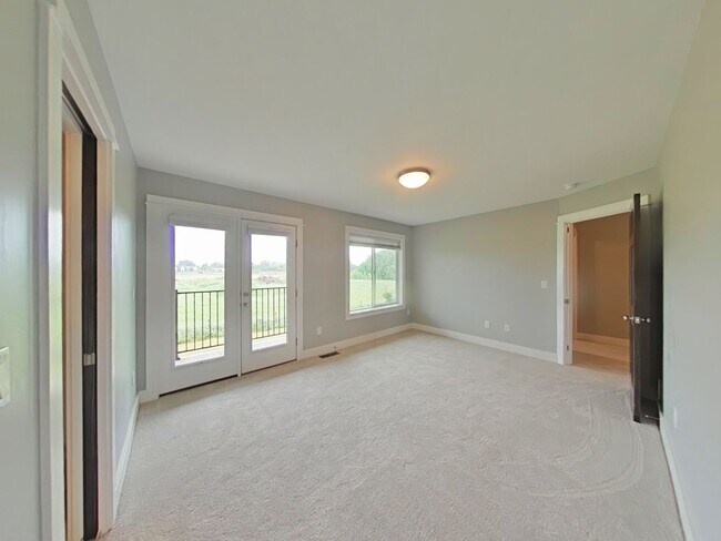 Building Photo - Stunning 3-bedroom, 2.5-bathroom condo with attached 2 stall garage!