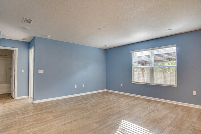 Building Photo - Season’s Savings! Spacious 5BR Near NAS – ...