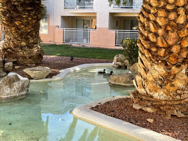 Building Photo - Partially Furnished 2/2 CONDO WITH  *BONUS DEN* & 2 CAR GARAGE!