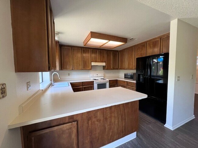 Building Photo - Nice pocket home with two fireplaces. Gardening service is included.