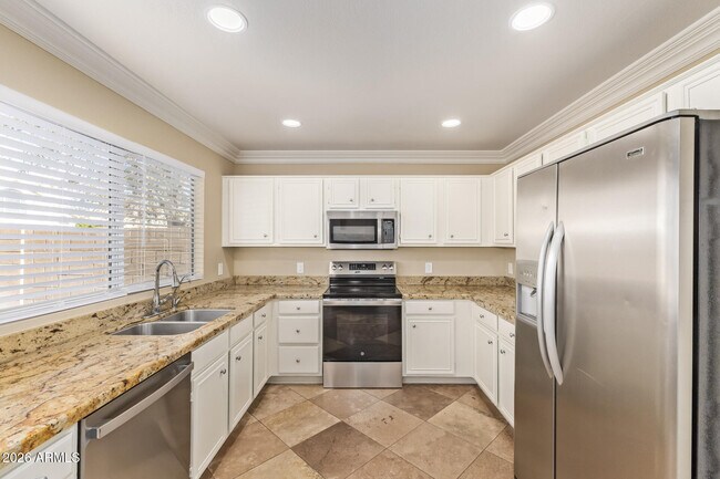 Building Photo - 7420 W Los Gatos Dr