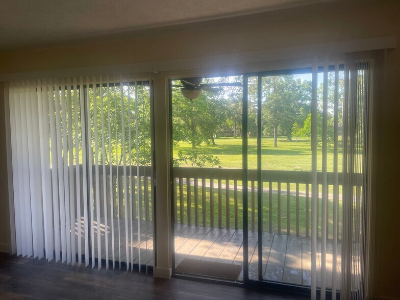 Rear covered balcony deck w golf course view - 1500 S Diamondhead Blvd