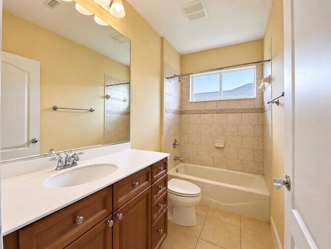 Building Photo - Now Available for Rent – 4/3 with flex room