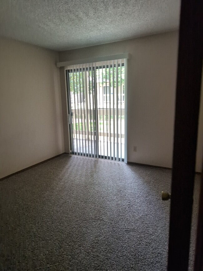 Building Photo - Charming 2BR/2BA Condo Near Lowry - AVAIL NOW!