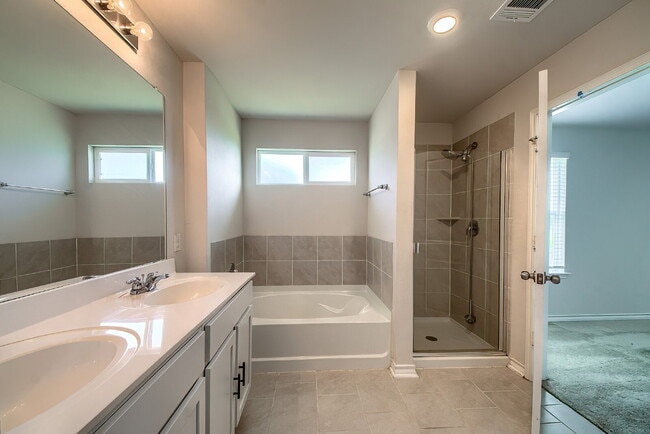 Building Photo - Welcome to this beautifully maintained 4-bedroom, 2-bathroom home in the highly desirable Whisper...