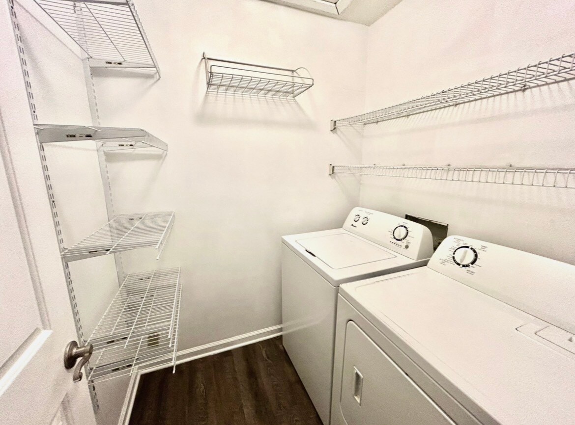 Utility room with washer and dryer - 1101 E Morehead St