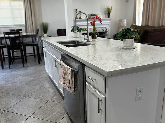 Building Photo - This beautifully remodeled 3-bedroom, 2-bathroom home is designed with an open concept layout