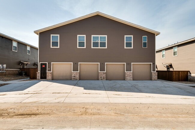 Building Photo - GORGEOUS 3 BEDROOM FOUR PLEX LOCATED IN MI...