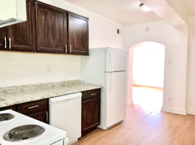 Building Photo - 5001 Tholozan Ave