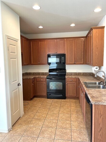 Recessed lights and oversized cabinets - 1702 Sand Hills Dr