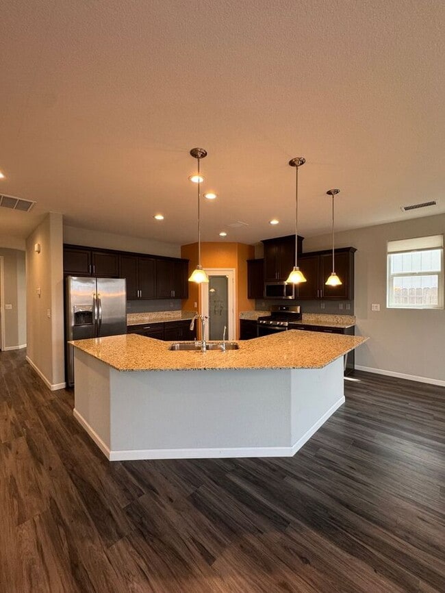 Building Photo - Spacious 4-Bedroom Dayton Home with Split-Bedroom Layout & Modern Finishes