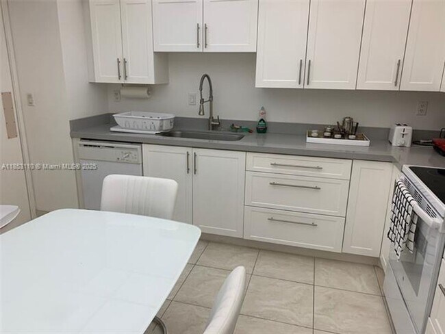Building Photo - 20191 E Country Club Dr