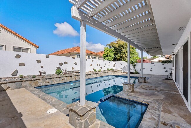 Building Photo - Coastal Elegance Meets Family Comfort in D...