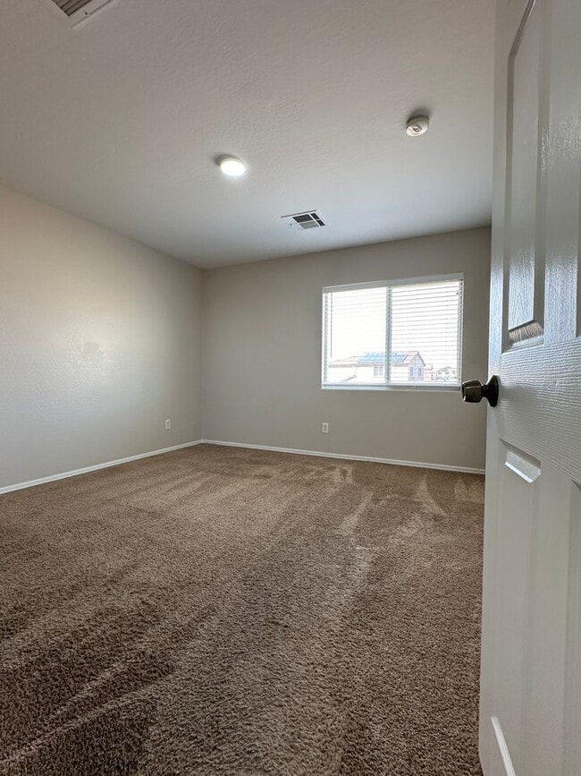 Building Photo - Buckeye, 4 bed, 2.5 bath, huge lot, across...